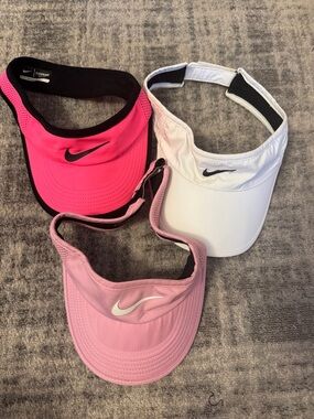 Nike Three-Pack Visors in Hot Pink, Light Pink & White